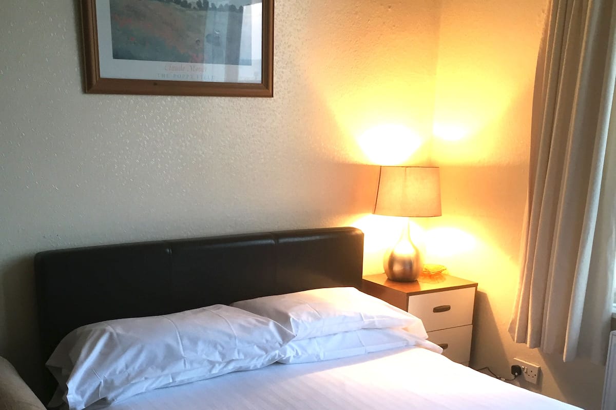 Desk, blackout curtains, iron/ironing board, free WiFi