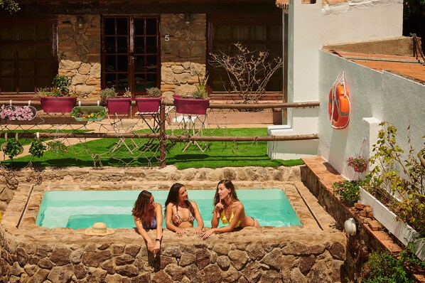 Seasonal outdoor pool, pool umbrellas, pool loungers