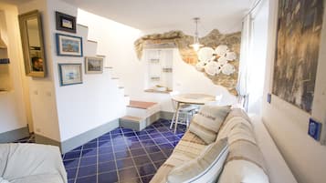 Apartamento, 1 quarto | Área de estar