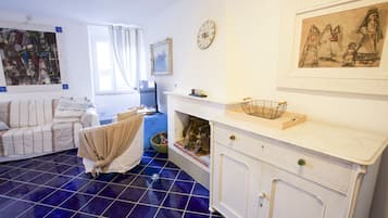 Apartamento, 1 quarto | Área de estar
