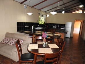 Family Townhome, 4 Bedrooms | Living area | Flat-screen TV - Casa Amigos by the beach (Quepos)