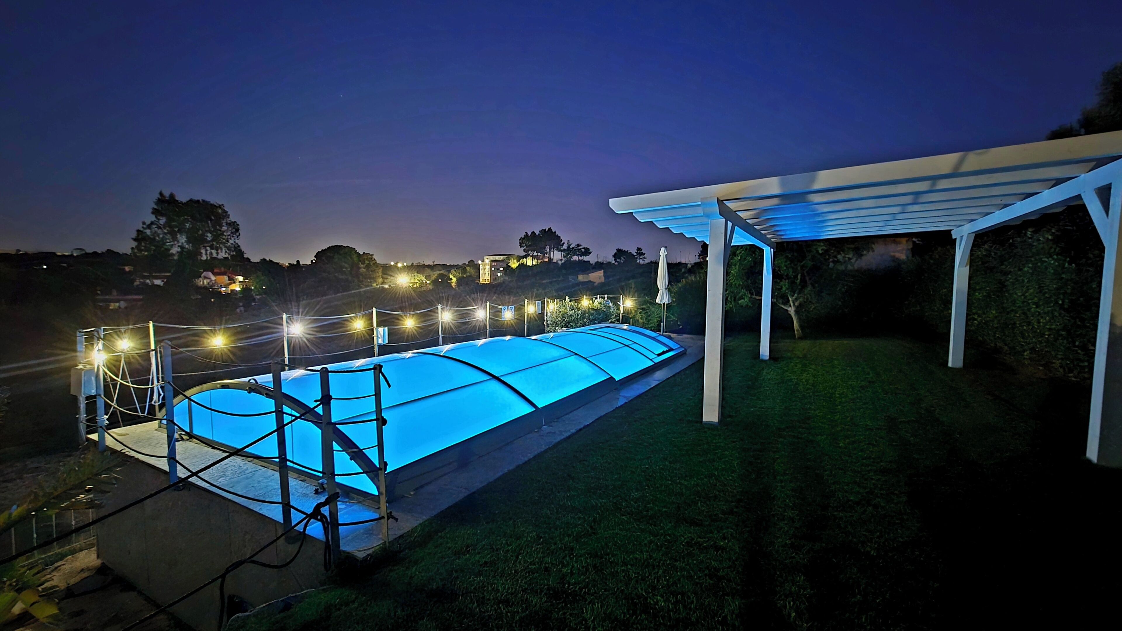 Seasonal outdoor pool, open 8:30 AM to 8:00 PM, pool umbrellas