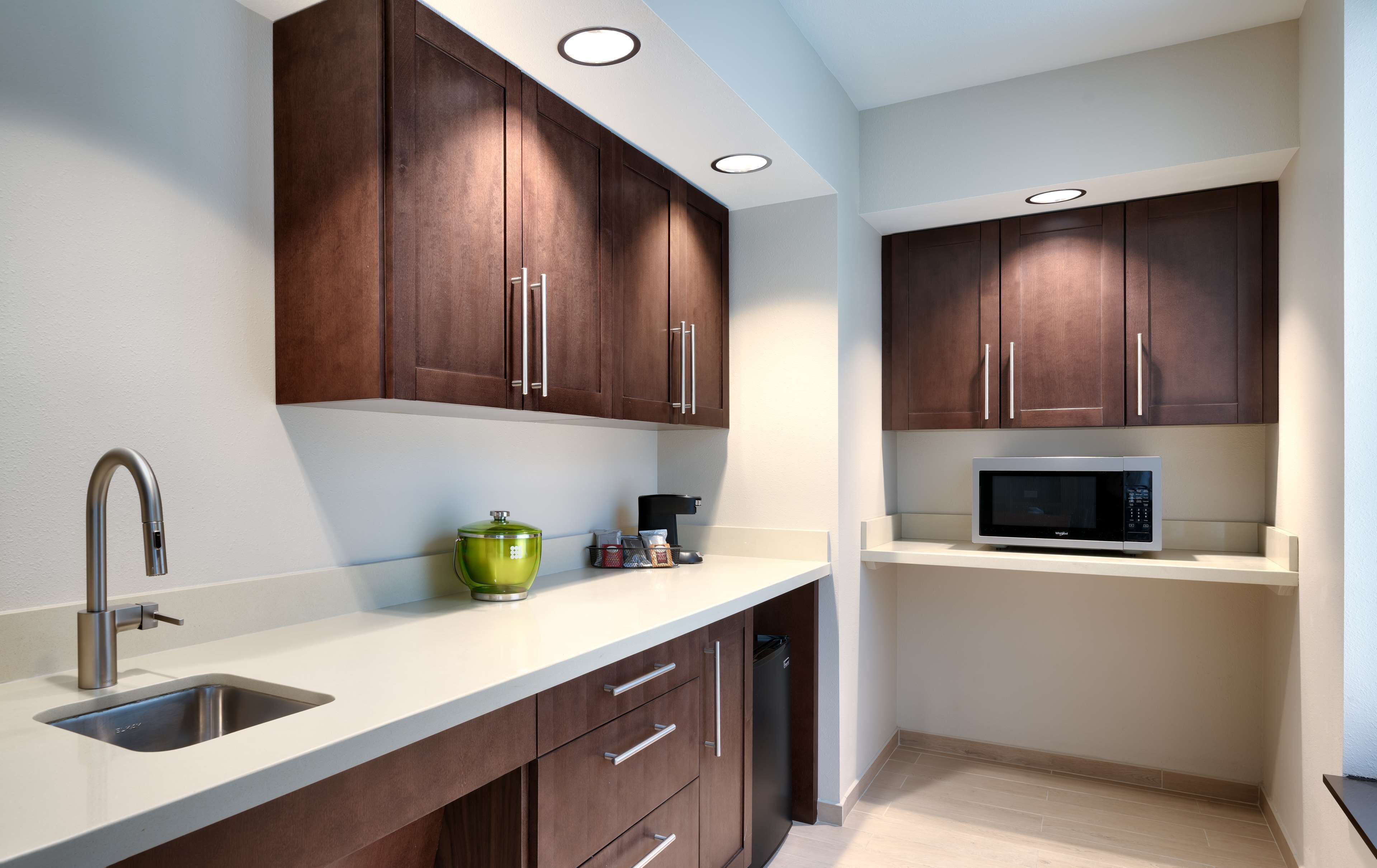 desk, laptop workspace, blackout curtains, free cots/infant beds