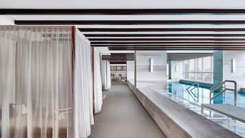 Guests can enjoy a swim in the pool, relax by the water, or retreat to their room with a comfortable bed.