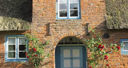 Comfortably furnished thatched roof house with a large garden