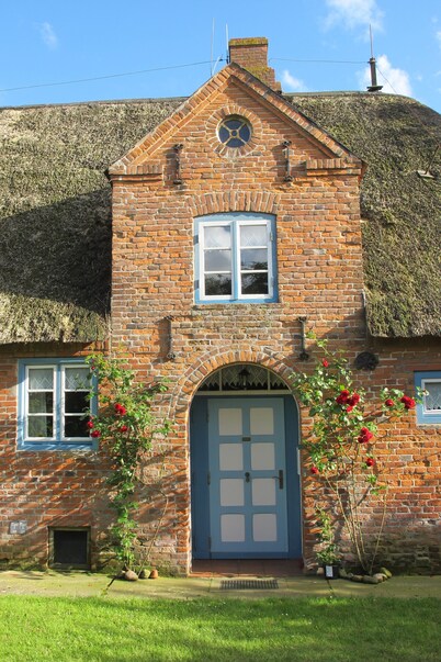Comfortably furnished thatched roof house with a large garden