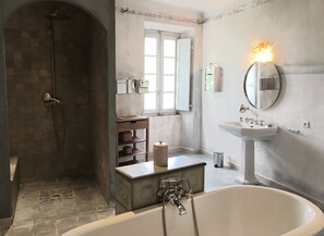 Combined shower/tub, hair dryer, towels, soap