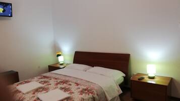 Standard Triple Room, Multiple Beds, Shared Bathroom, Park View | Down duvets, minibar, desk, laptop workspace