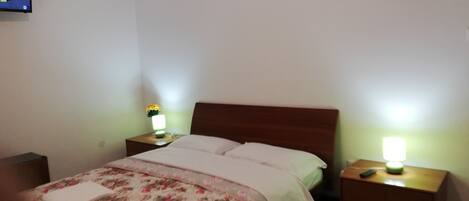 Classic Triple Room, Multiple Beds, Shared Bathroom, Park View | Minibar, desk, free WiFi, bed sheets