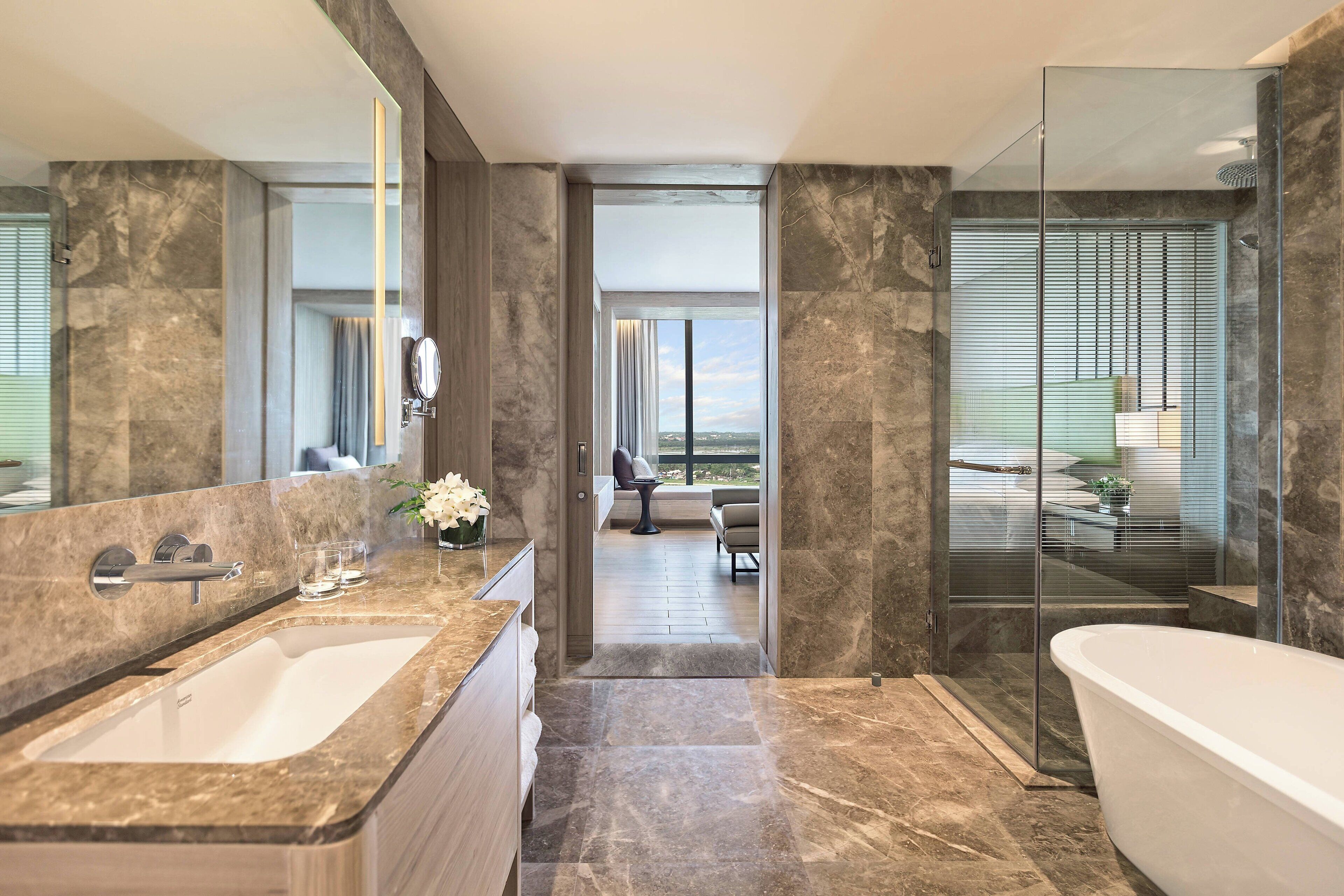 junior suite, 1 bedroom, city view | bathroom | shower, designer toiletries, hair dryer, bathrobes