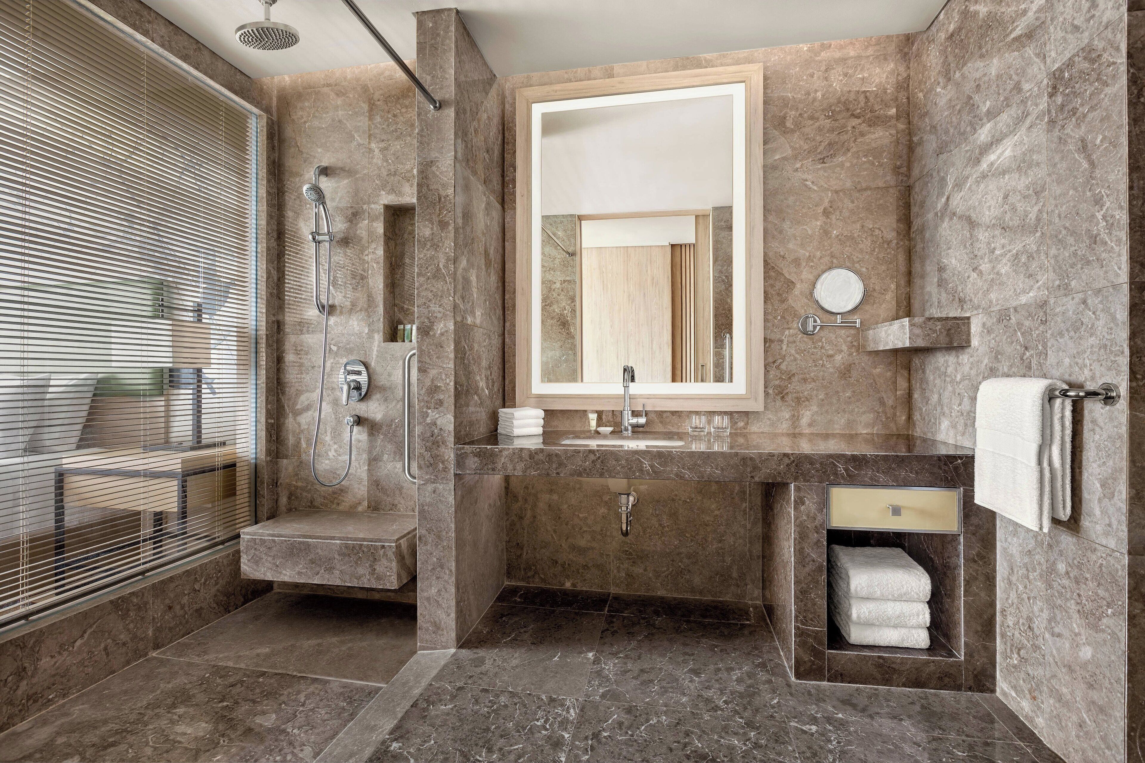 shower, designer toiletries, hair dryer, bathrobes