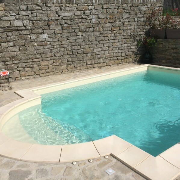 Outdoor pool, pool umbrellas, pool loungers