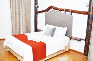 Quarto duplo família, 2 quartos (Numbaime) | 1 quarto, roupas de cama premium, frigobar, cofres nos quartos