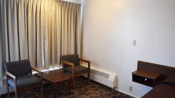 Standard Single Room, 1 Queen Bed, Non Smoking | Living area | Flat-screen TV
