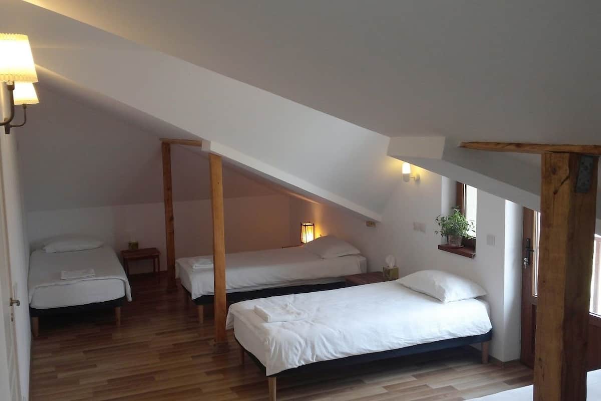 Family Quadruple Room, Multiple Beds, Private Bathroom, Courtyard View | Cots/infant beds, rollaway beds, free WiFi