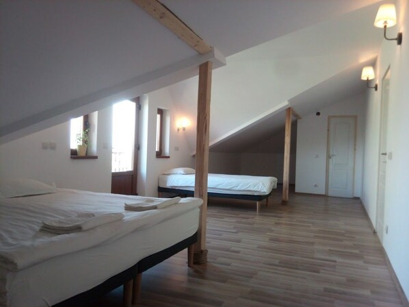 Family Quadruple Room, Multiple Beds, Private Bathroom, Courtyard View | Cribs/infant beds, rollaway beds, free WiFi