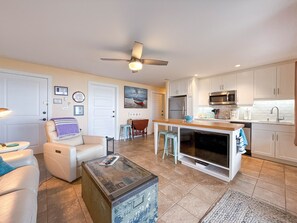 Smart TV, fireplace, books, offices