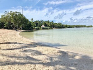 On the beach, sun-loungers, beach towels