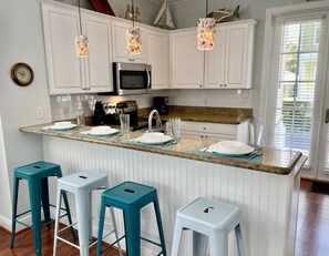 Fridge, microwave, oven, stovetop - OCEANSIDE  ANGLERS REEF  HOME- Gated Community with Pool, Dock, Private Beach (Islamorada)