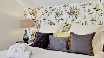 2 quartos, ferros/tábuas de passar roupa, acesso à internet