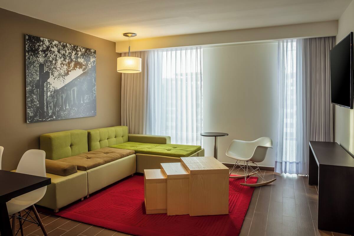 Junior Suite, 1 King Bed | In-room safe, desk, iron/ironing board, cribs (free)