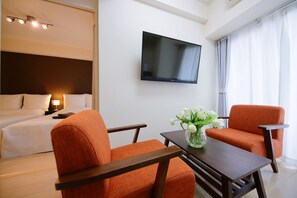 Quadruple Room (2 Small Double Beds) | Living area | 43-inch flat-screen TV with digital channels, TV - Grandouce Tengachaya (Osaka)
