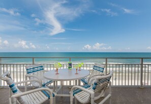 Outdoor dining - Luxury Oceanfront SR701 with Wraparound Balcony Pet Friendly (New Smyrna Beach)