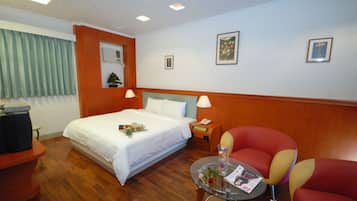 Habitación Deluxe doble | Escritorio, cortinas opacas, sistema de insonorización