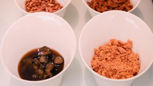 Four white bowls containing different food items. - Cai-Lai Hotel (Taoyuan City)