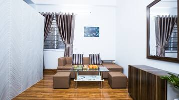 32-inch TV with cable channels, MP3 dock