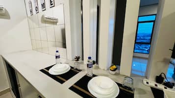 Studio, Non Smoking | Private kitchen | Fridge, microwave, stovetop, coffee/tea maker