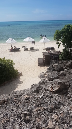 Private beach, white sand, free beach cabanas, sun-loungers