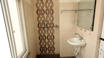 Shower, free toiletries, hair dryer, slippers