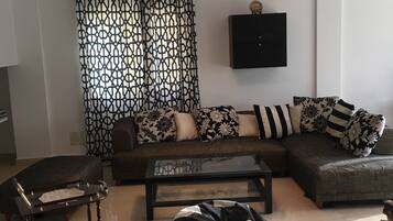 Vila Comfort, 4 kamar tidur | Ruang keluarga | TV LCD