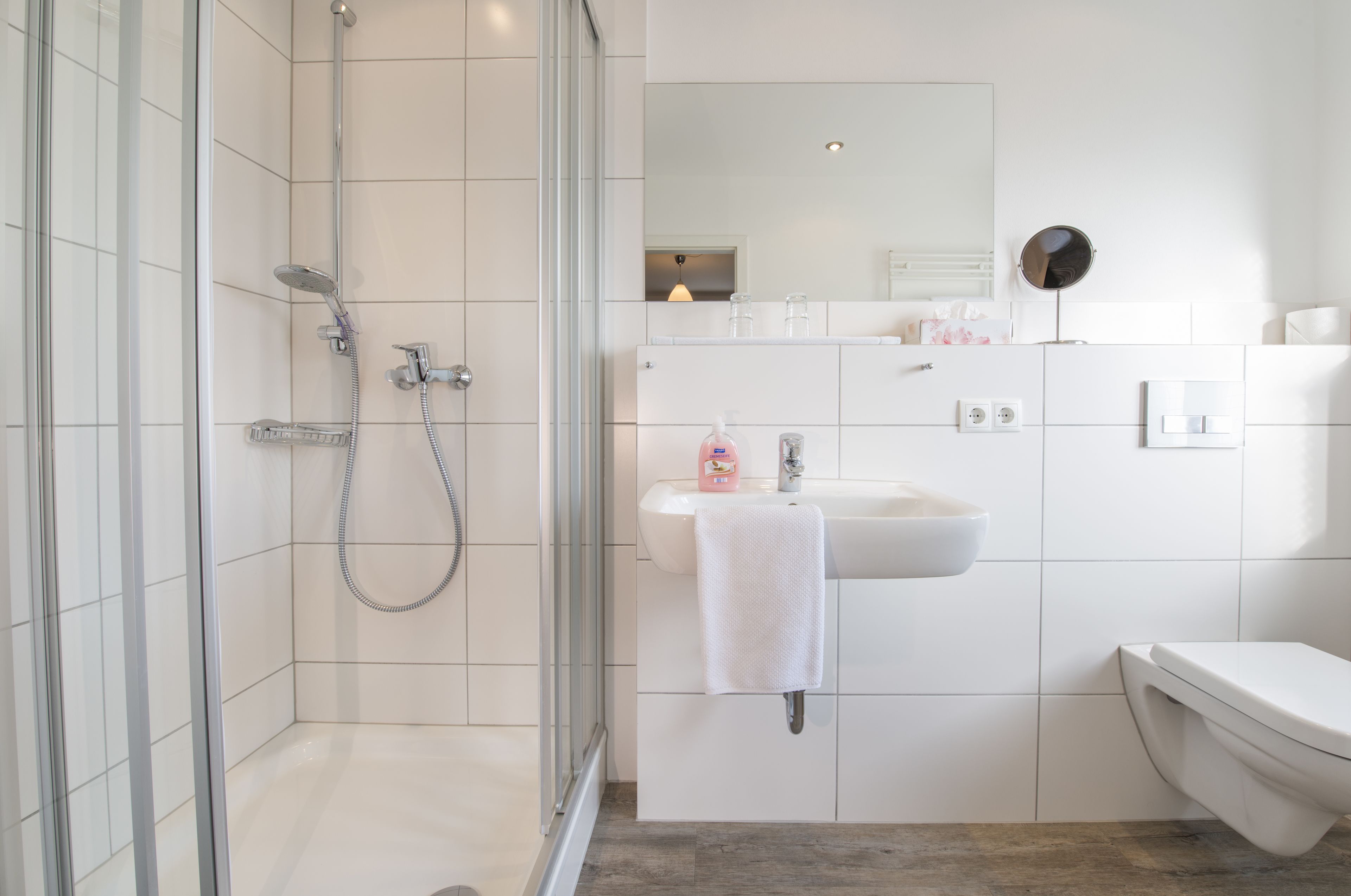 comfort double room | bathroom | shower, free toiletries, hair dryer, towels
