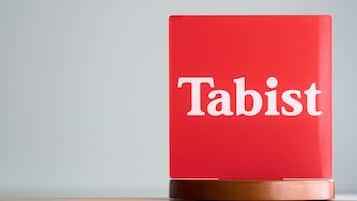 Un objeto rojo con la palabra "Tabist" escrita en él.