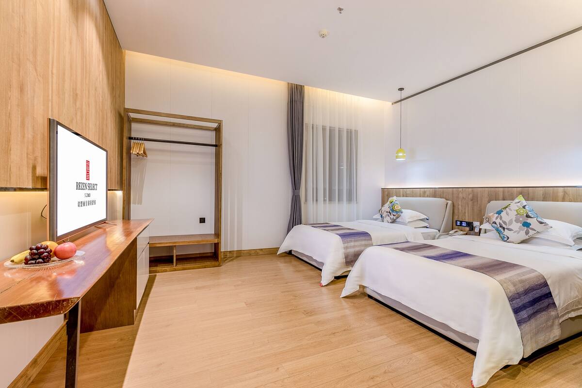 Superior Twin kamer | Luxe beddengoed, verduisterende gordijnen, een strijkplank/strijkijzer
