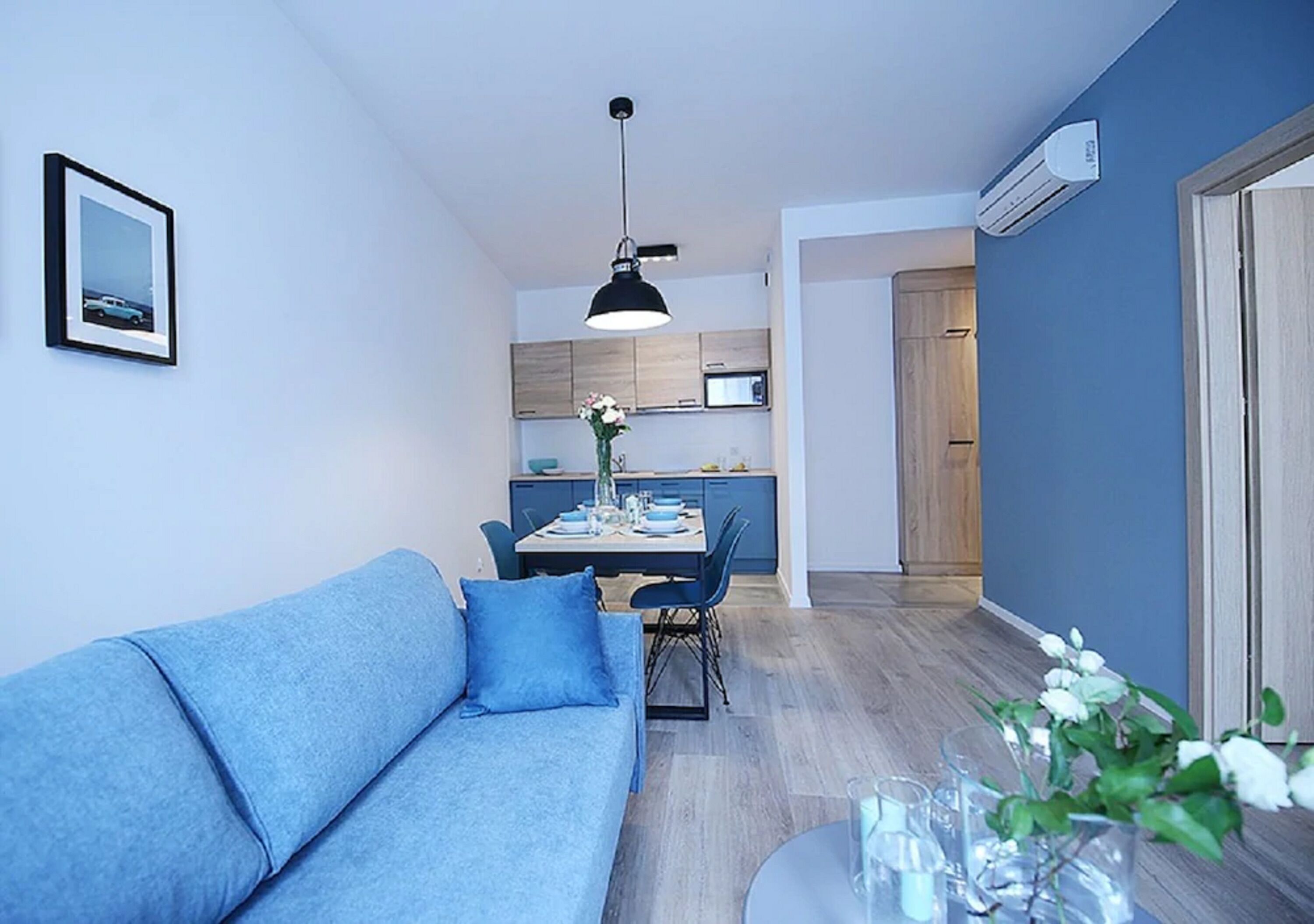 Leilighet – deluxe, 1 soverom | Oppholdsrom | Flatskjerm-TV