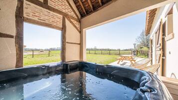 Exclusieve cottage, en-suite badkamer | Spa | Een bubbelbad