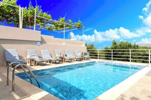 Outdoor pool, a heated pool, pool umbrellas, sun loungers - Cretan Breeze Villa Heated Pool (Apokoronas)