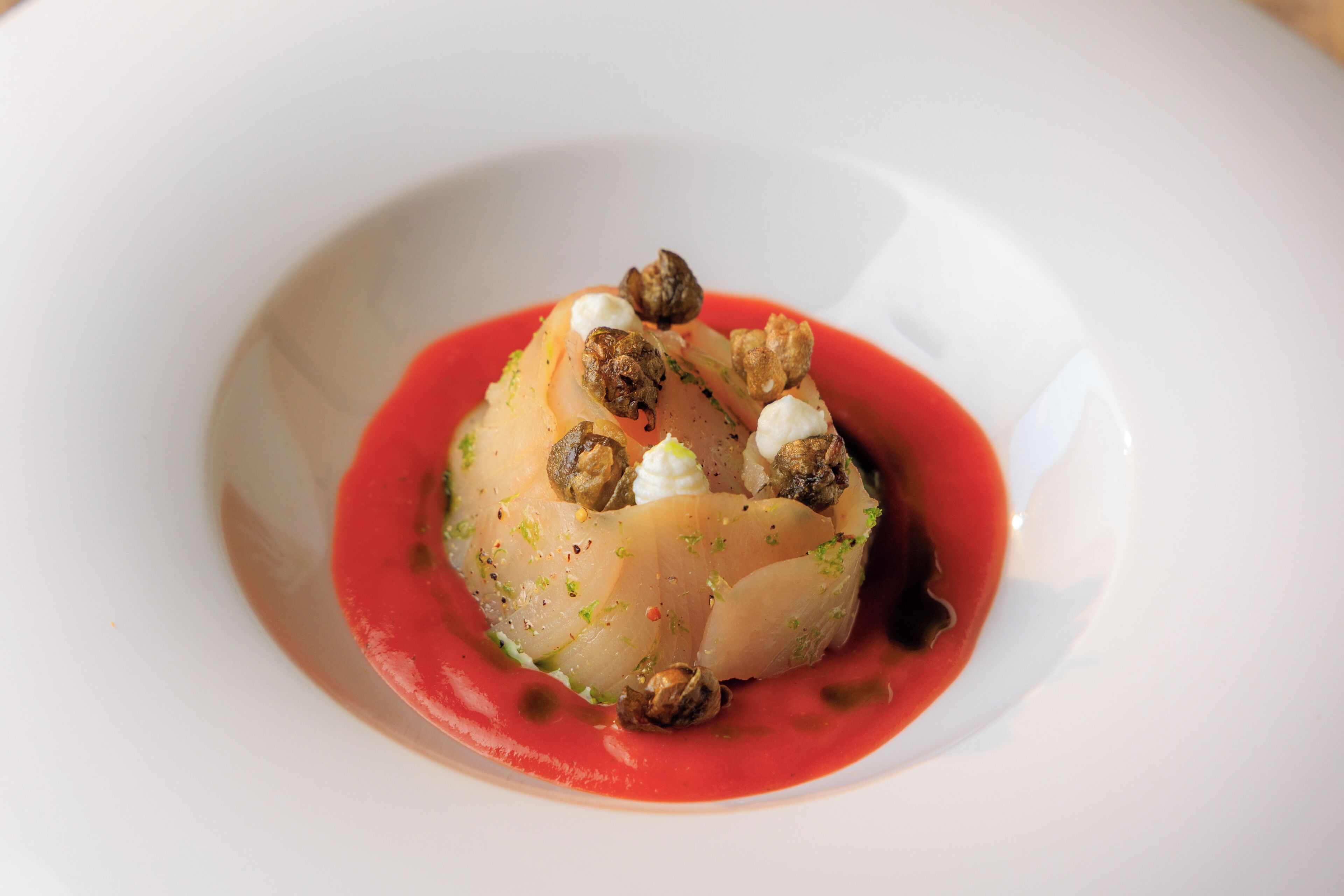 A white plate with a food dish.