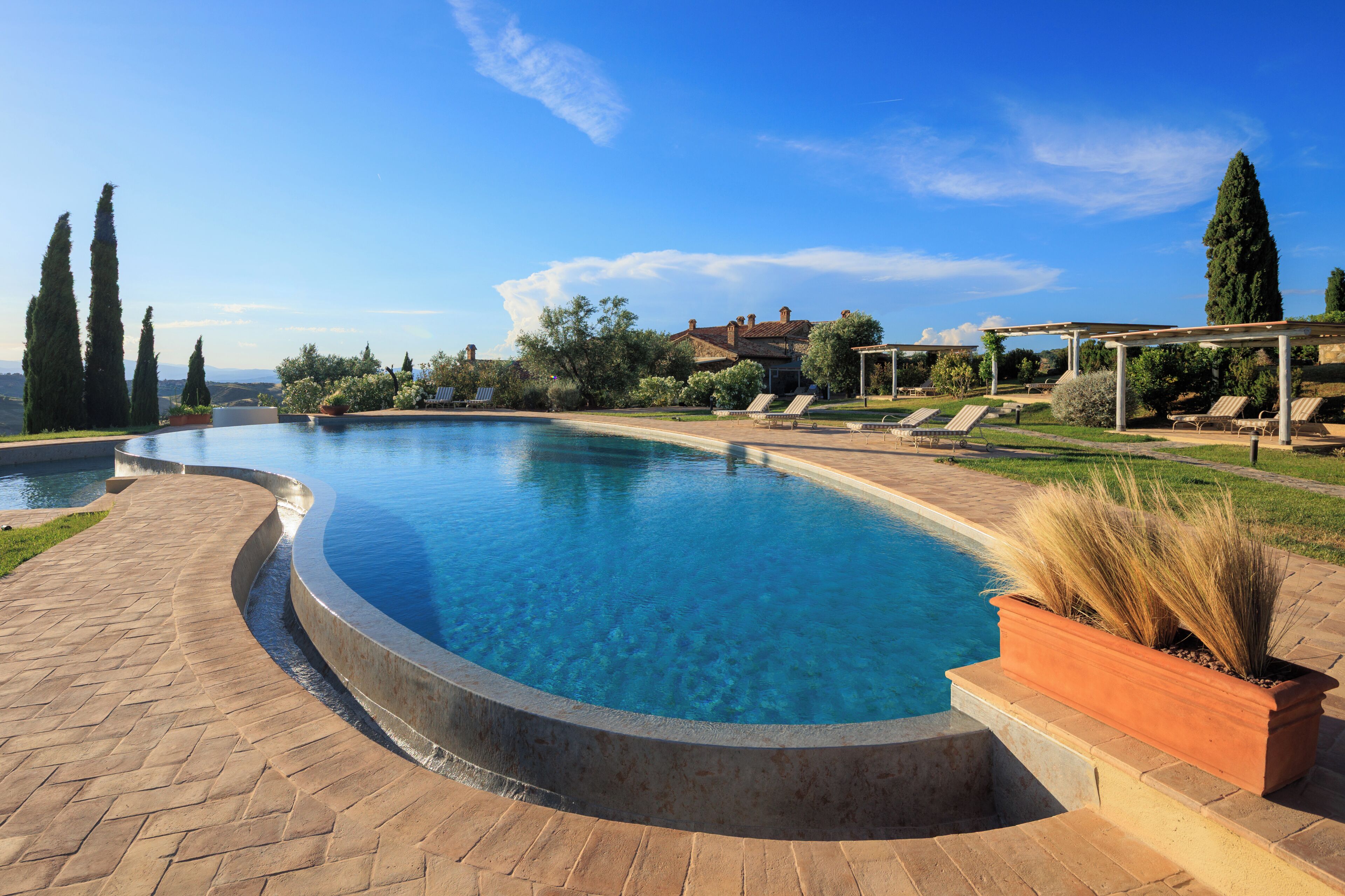 Seasonal outdoor pool, an infinity pool, free cabanas, pool umbrellas