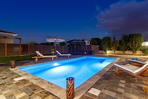 Outdoor pool, pool umbrellas, pool loungers