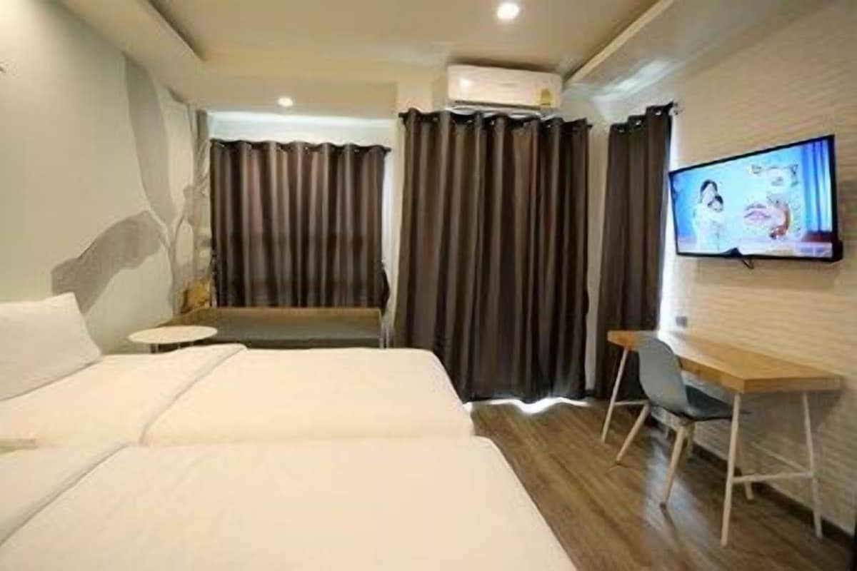 Espacio para trabajar con laptop, cortinas blackout y wifi gratis 