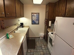 Condo, 2 Bedrooms | Private kitchen | Fridge, coffee/tea maker, toaster