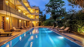 Outdoor pool, open 7:00 AM to 7:00 PM, pool umbrellas, sun loungers