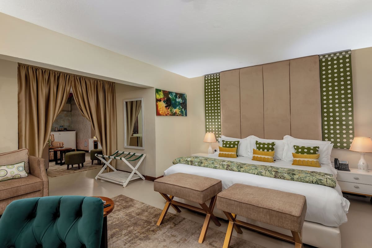 1 habitación, ropa de cama de alta calidad y minibar 