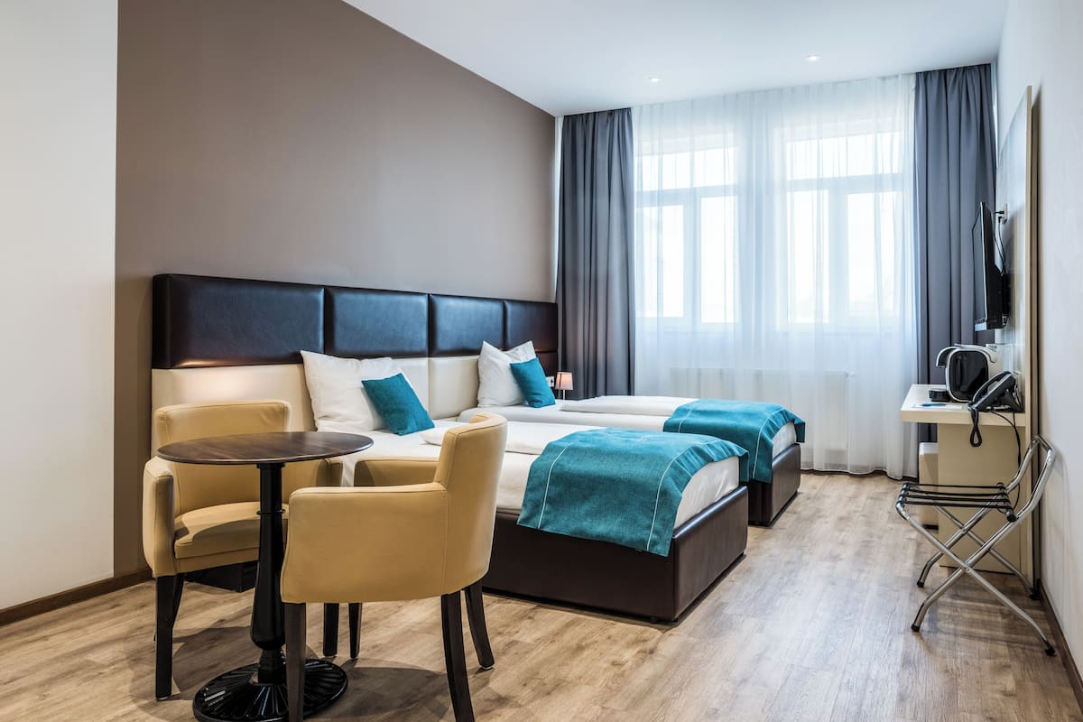 Superior kamer, 1 twee- of 2 eenpersoonsbedden | Luxe beddengoed, een kluis op de kamer, een bureau, een laptopwerkplek