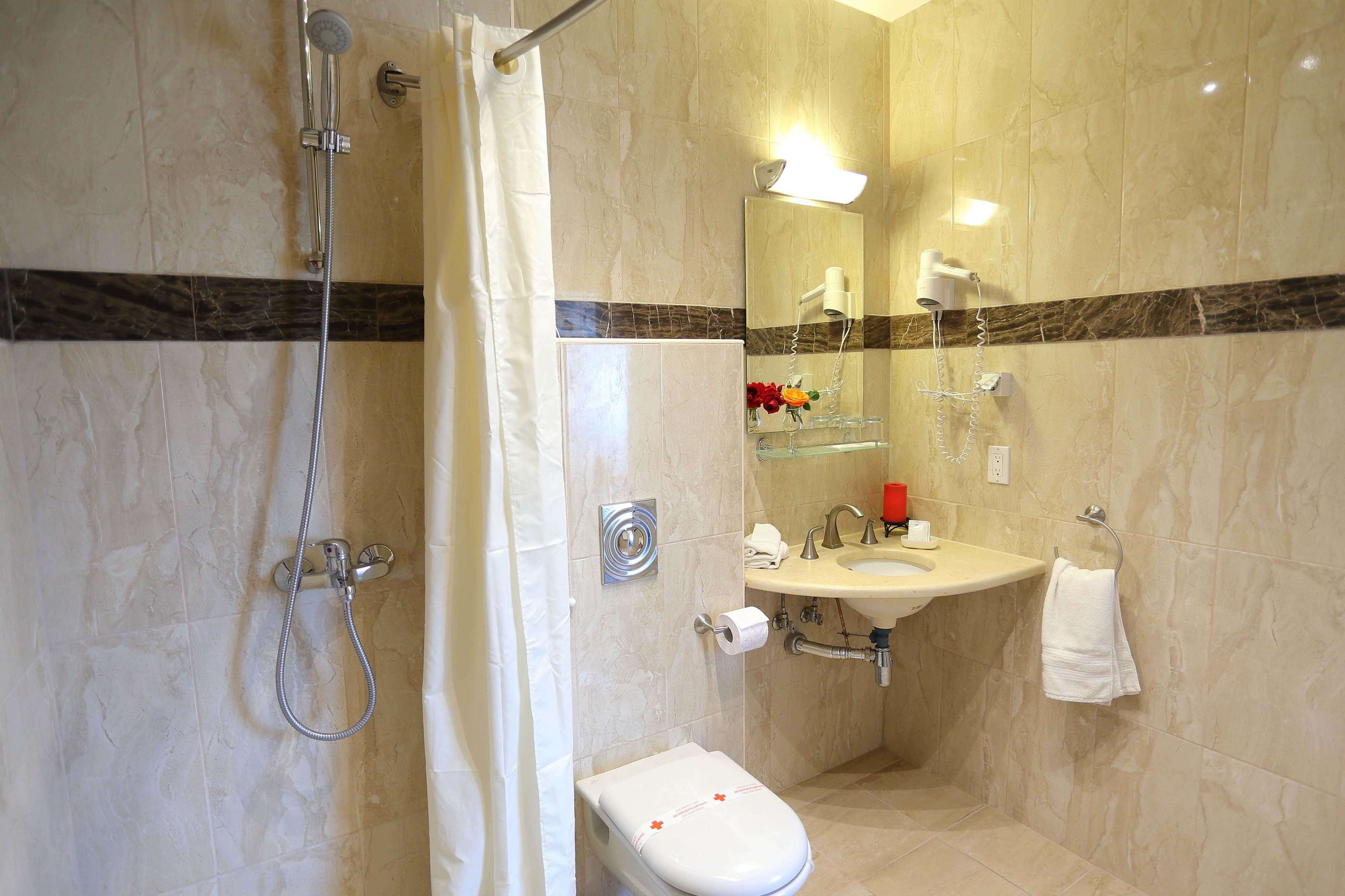 shower, free toiletries, hair dryer, bathrobes