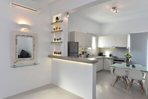 Appartement, 3 chambres | Coin séjour | Télévision à écran plat